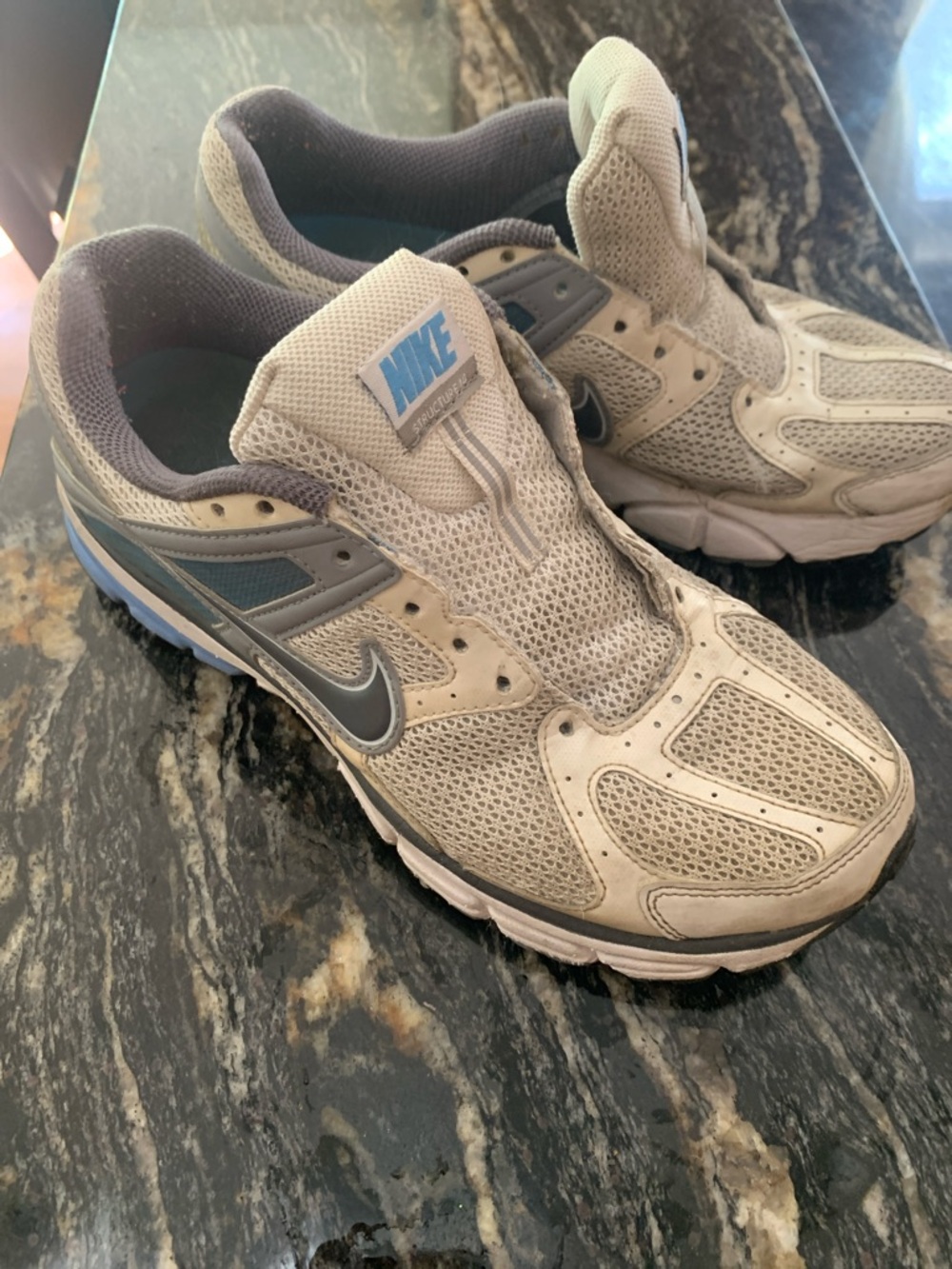 Nike women's Beige Mesh Athletic Sneakers with Light Blue Accents